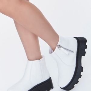 White platform Chelsea boots, size 9.